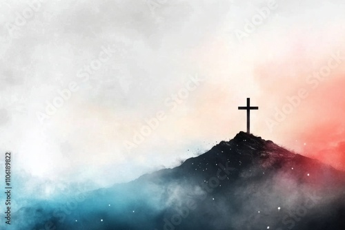 Cross stands on a mountain peak shrouded in mist during early morning