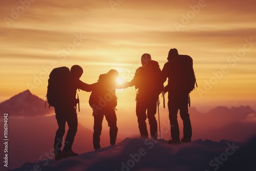 Friends celebrate a stunning sunset while hiking on a mountain peak in the ea...