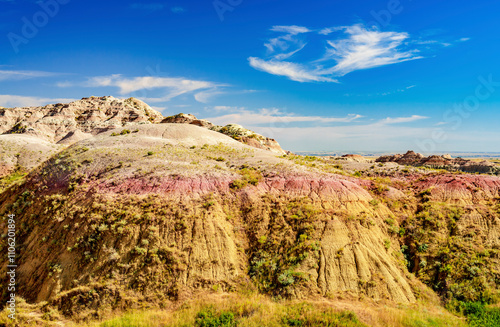 Rugged multi color plains, mountains and valleys of Badlands National Park near Wall, South Dakota photo