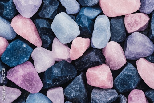 Colorful collection of various gemstones and crystals displayed on a dark bac...