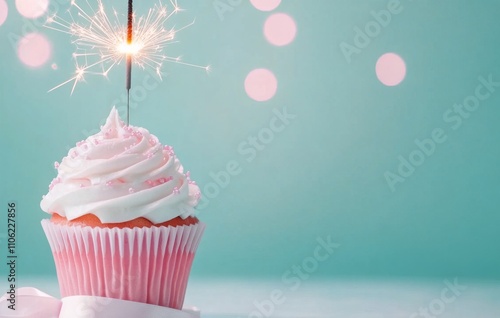 Sparkling cupcake celebration with colorful sprinkles and ribbon on blue back...