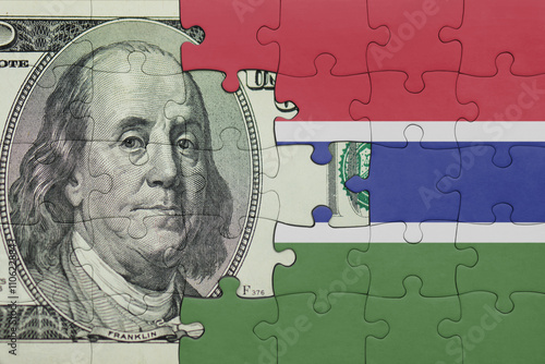 Wallpaper Mural puzzle with the national flag of gambia and the usa dollar money .finance concept Torontodigital.ca