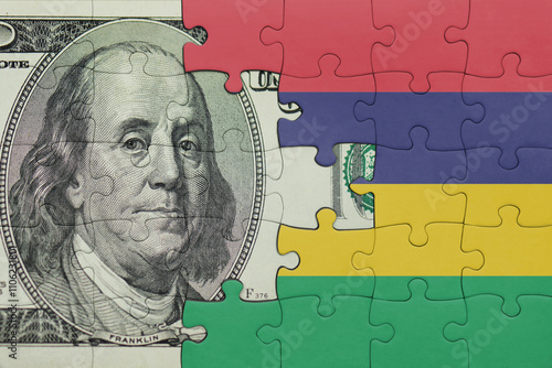 Wallpaper Mural puzzle with the national flag of mauritius and the usa dollar money .finance concept Torontodigital.ca