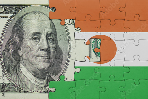 Wallpaper Mural puzzle with the national flag of niger and the usa dollar money .finance concept Torontodigital.ca