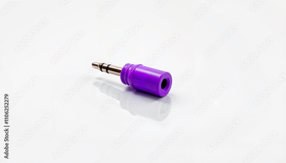 Isolated item on white background in the form of a purple audio jack adapter
Isolated item on white background in the form of a purple audio jack adapter