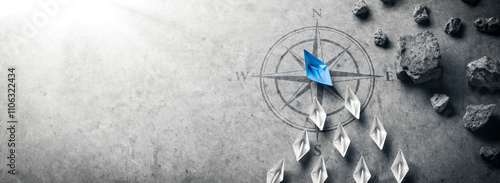 Wallpaper Mural Blue Paper Boat With Compass Rose Leading A Fleet Of Small White Boats Away From Rocks On Grey Concrete - Leadership Concept	
 Torontodigital.ca