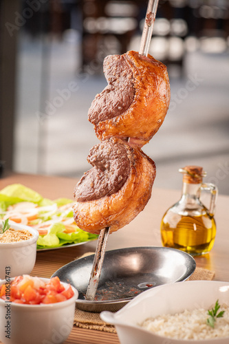 comida de boteco , comida mineira , arroz e feijao , tutu, carne com ouro, carré de cordeiro,picanha no espeto , no ponto , maccaroa com carne moida , linguiça, frango com bata fritas, costela com mol photo