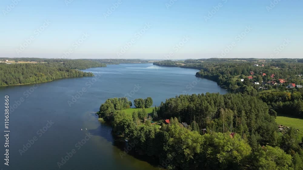Lake Radunskie Dolne is a flow-through channel lake in the Kashubian Lakeland. Aerial view Poland. Lake Radunskie Dolne is a flow-through channel lake in the Kashubian Lakeland. Aerial view Poland.