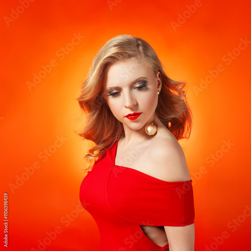 Glamorous Woman in Red Dress with Beauty Makeup