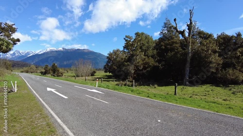 Wind blowing on new zealand countryside road