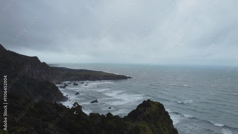Wind blowing over lush coastline in new zealand Wind blowing over lush coastline in new zealand