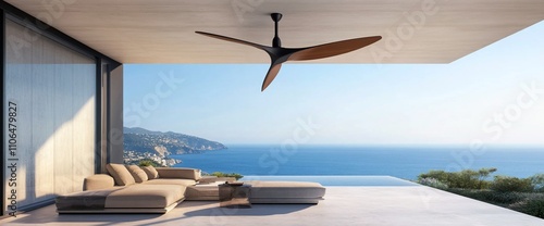 Modern ceiling fan in luxury outdoor patio overlooking ocean.