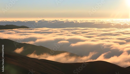 Sunset glow reflects on hills, and rolling clouds present a wonderful scenery.