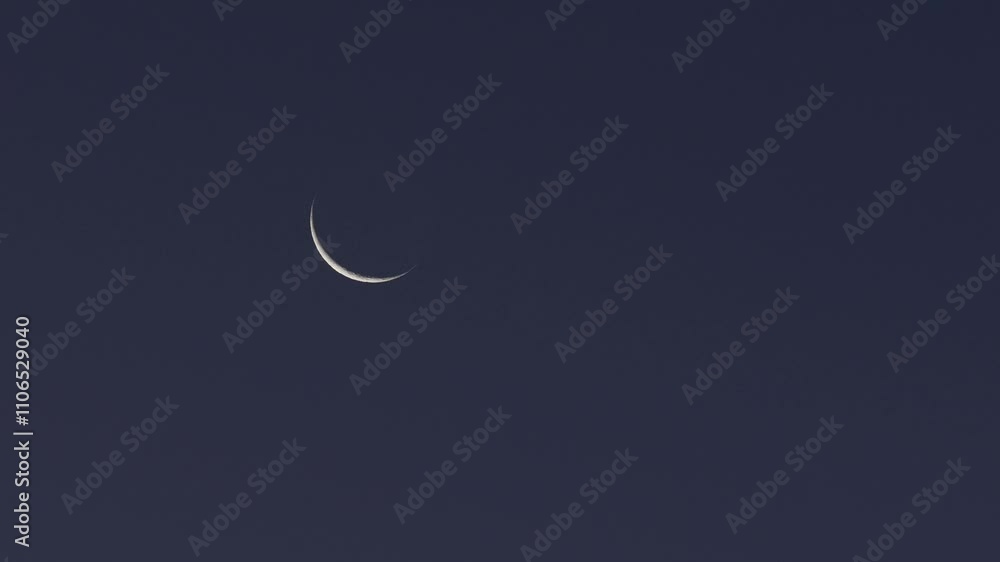 Tokyo,Japan - November 29, 2024: Waxing Crescent Moon with earthshine at winter dawn Tokyo,Japan - November 29, 2024: Waxing Crescent Moon with earthshine at winter dawn