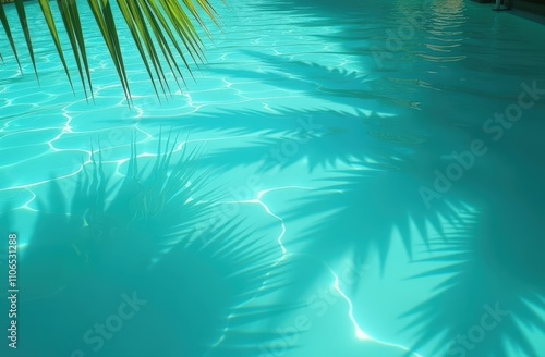 Tropical summer background with pool water surface and palm leaf shadow. Luxury hotel resort