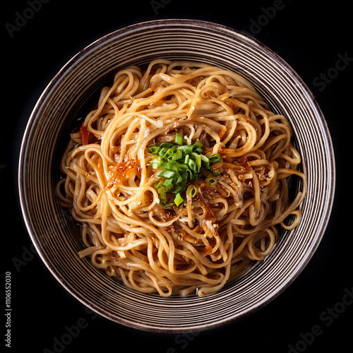 A bowl of Lo Mein isolated on black background photo