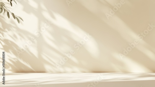 Minimalistic abstract gentle light beige background for product presentation with light andand intricate shadow from the window and vegetation on wall.