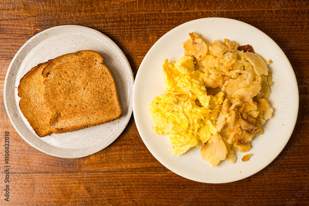 Scrambled eggs with potatoes and toast Scrambled eggs with potatoes and toast