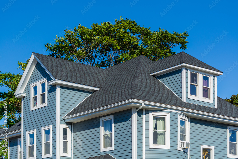 Beautiful family house with blue siding and white trim in Brighton, Massachusetts, USA
Beautiful family house with blue siding and white trim in Brighton, Massachusetts, USA