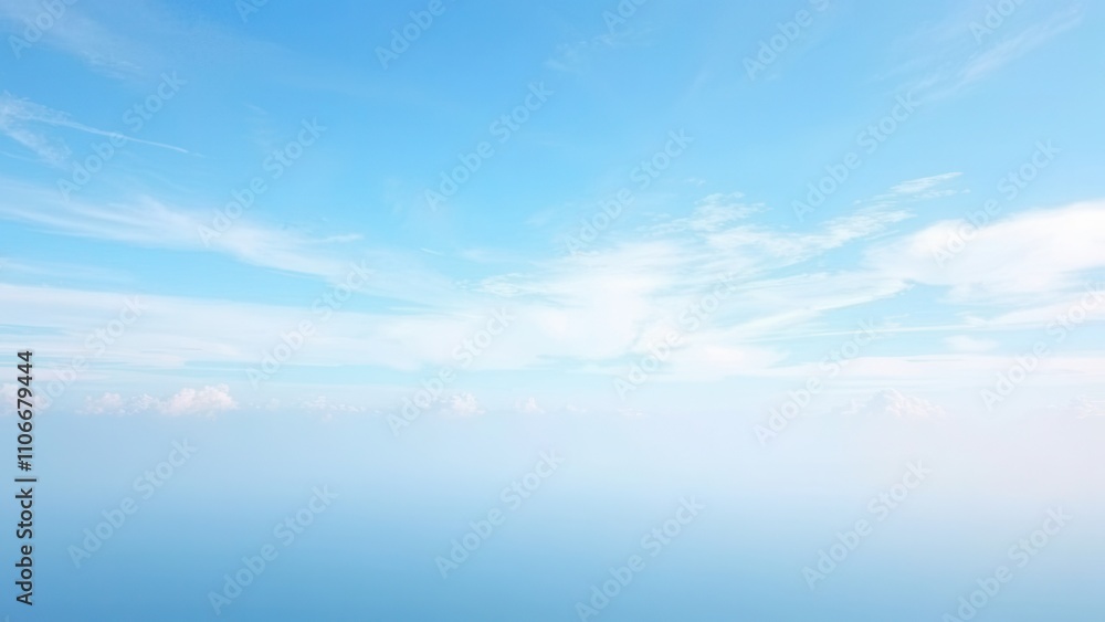 Blue morning sky with wispy stratocumulus clouds drifting lazily across the horizon, serene landscapes, calm atmosphere, gentle clouds Blue morning sky with wispy stratocumulus clouds drifting lazily across the horizon, serene landscapes, calm atmosphere, gentle clouds