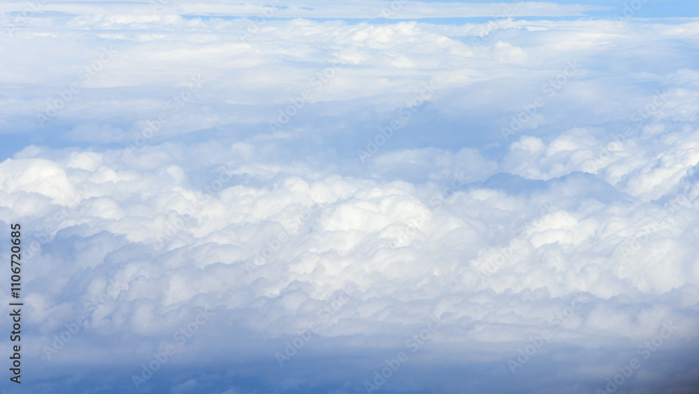 Aerial view layers of soft white clouds floating, serene blue sky, peaceful Aerial view layers of soft white clouds floating, serene blue sky, peaceful