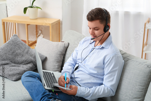 Teenage boy with notebook, ...