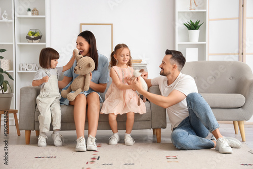 Happy family playing with t...
