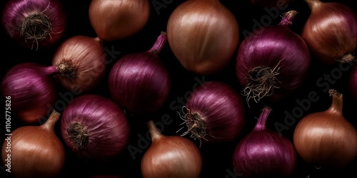 Mischung aus roten und braunen Zwiebeln auf dunklem Hintergrund, harmonische Farbgebung photo