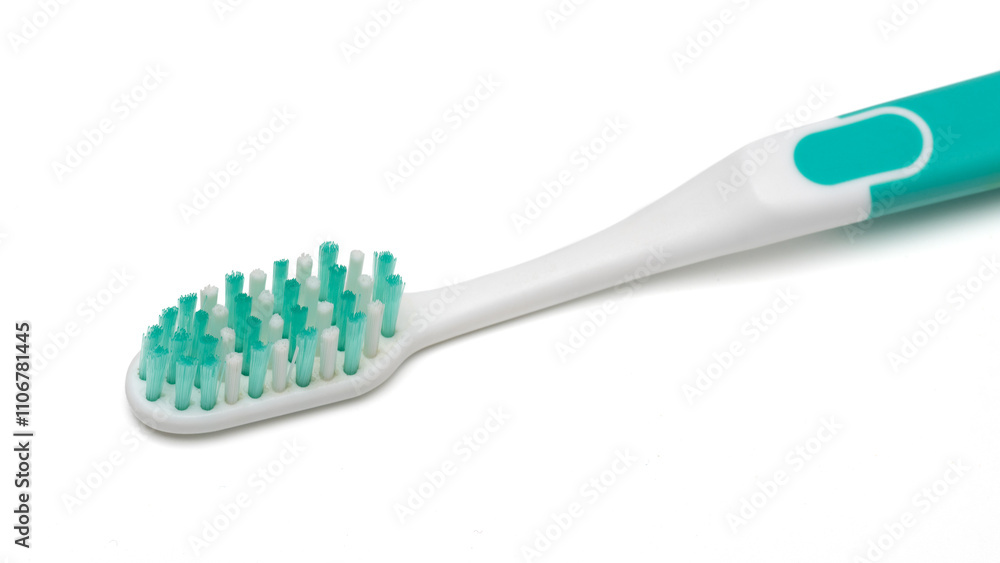 close up view of a toothbrush isolated on white background. close up view of a toothbrush isolated on white background.