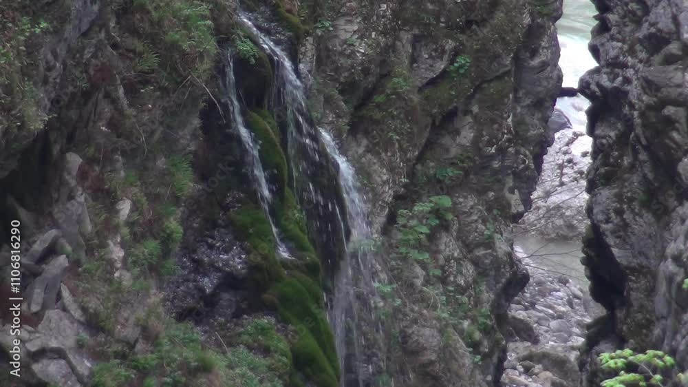 Caucasus, North Ossetia. Digoria gorge. Waterfall in the canyon. Caucasus, North Ossetia. Digoria gorge. Waterfall in the canyon.