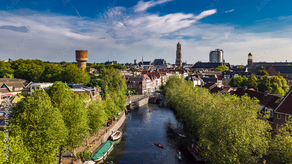 Obraz premium Utrecht town аerial drone view from above, typical Dutch city skyline, Utrecht cityscape with tower, canals and houses, Holland, Netherlands