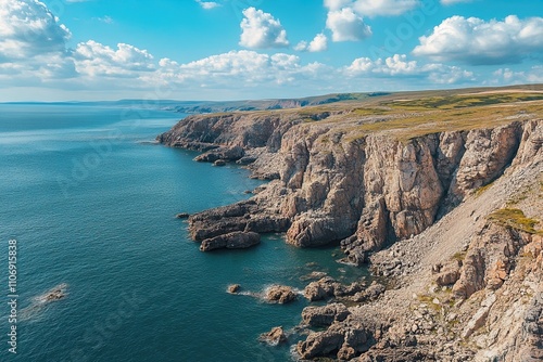 Drone view of the sea coast. Rocky shore and sea water. Vacation and travel. Summer seascape. aerial view. Image for cards, background, wallpaper or design.