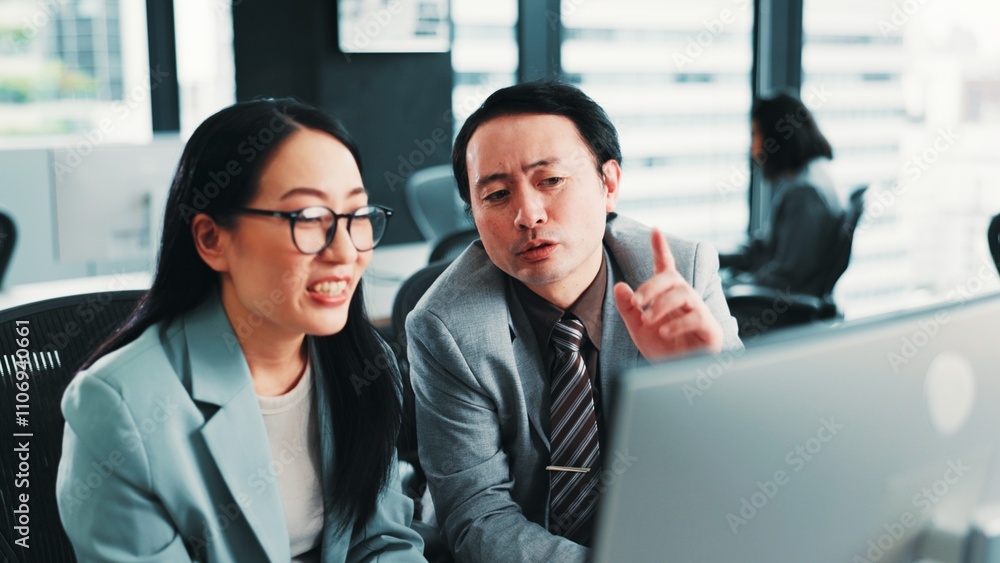 Office, manager and Asian business people on computer with feedback, review and meeting for online project. Help, corporate and worker with boss for teamwork, collaboration and discussion in Japan Office, manager and Asian business people on computer with feedback, review and meeting for online project. Help, corporate and worker with boss for teamwork, collaboration and discussion in Japan