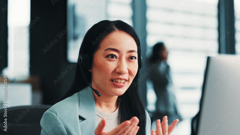 Woman, telemarketing and customer center agent in office, talking and advisor to client. Female person, help desk representative and support consumer with loan, Japan and insurance agency on computer Woman, telemarketing and customer center agent in office, talking and advisor to client. Female person, help desk representative and support consumer with loan, Japan and insurance agency on computer