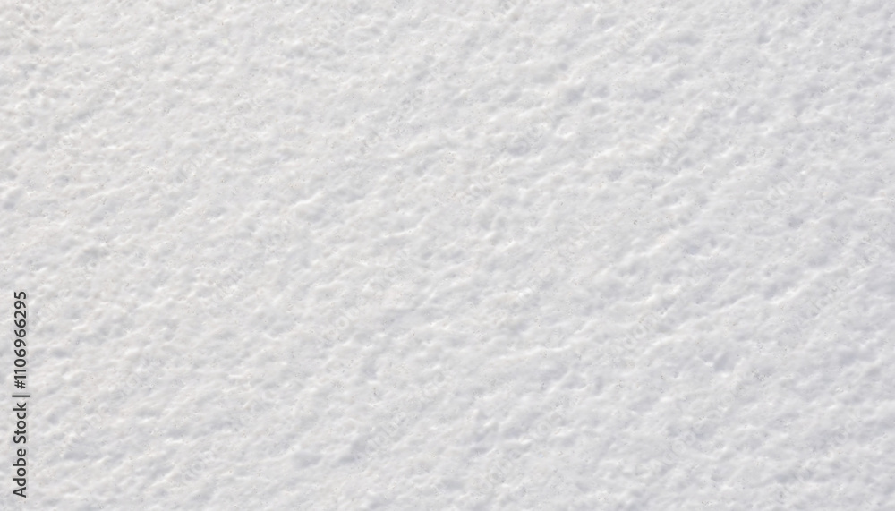 Fototapeta premium A clean snow texture illuminated by soft daylight
