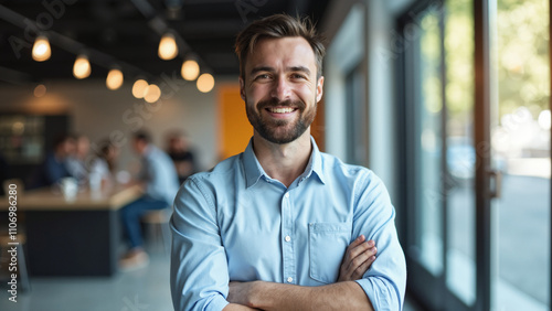 Confident Business Leader: Portrait of Smiling Man with Arms Crossed - Perfect for Startup Success Stories and Leadership Articles