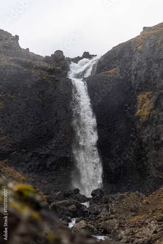 waterfall in the mountains of iceland