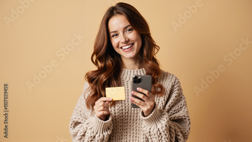 Confident Young Woman with Credit Card and Smartphone: Online Shopping, E-commerce, and Digital Banking Concept