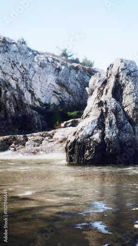 Landscape of Ocean and rocky cliff photo