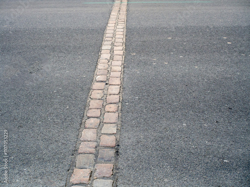 Track of the Berlin wall on the city street, Berlin, Germany photo