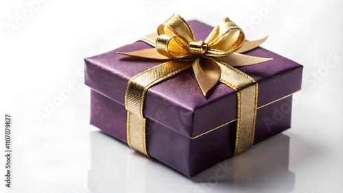 Purple gift box wrapped with a gold ribbon, rich and elegant feeling for special occasions like weddings or luxury gifts