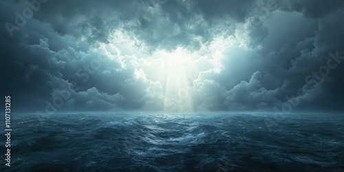 Fototapeta Naklejka Na Ścianę i Meble -  A horizon filled with thick, dark storm clouds with beams of light breaking through.