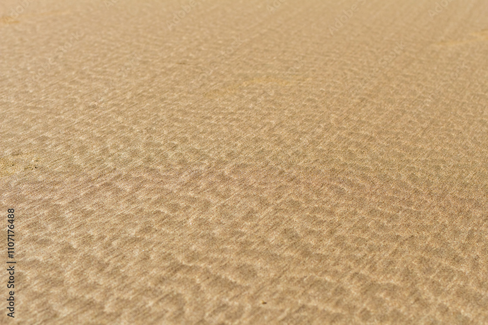 Fototapeta premium Abstract Sand Pattern: Textured Design by the Sea