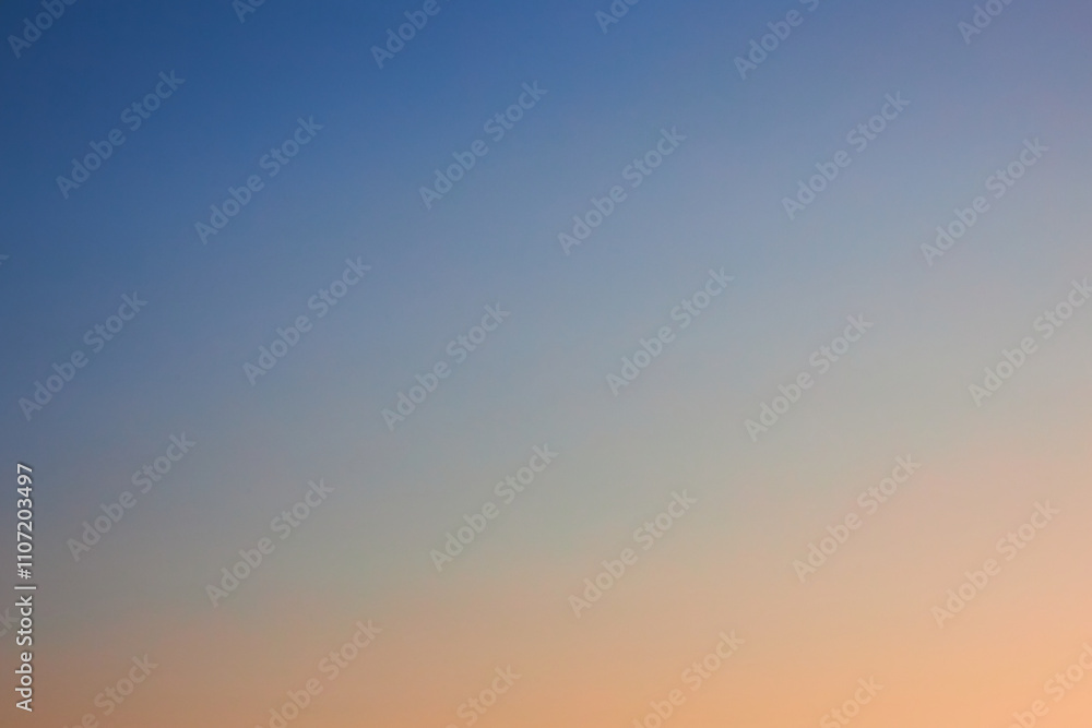 Gradient from blue to pink yellow. Photo of Cloudless clear sky at sunset, background. Natural gradient wallpaper. Peach fuzz color Gradient from blue to pink yellow. Photo of Cloudless clear sky at sunset, background. Natural gradient wallpaper. Peach fuzz color