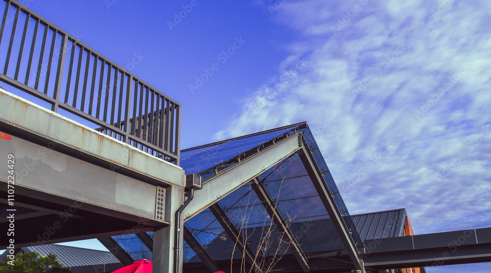 Fototapeta premium Row of red brick english houses An old vintage private house from red bricks in front of abandoned railway station in Knislinge, Sweden