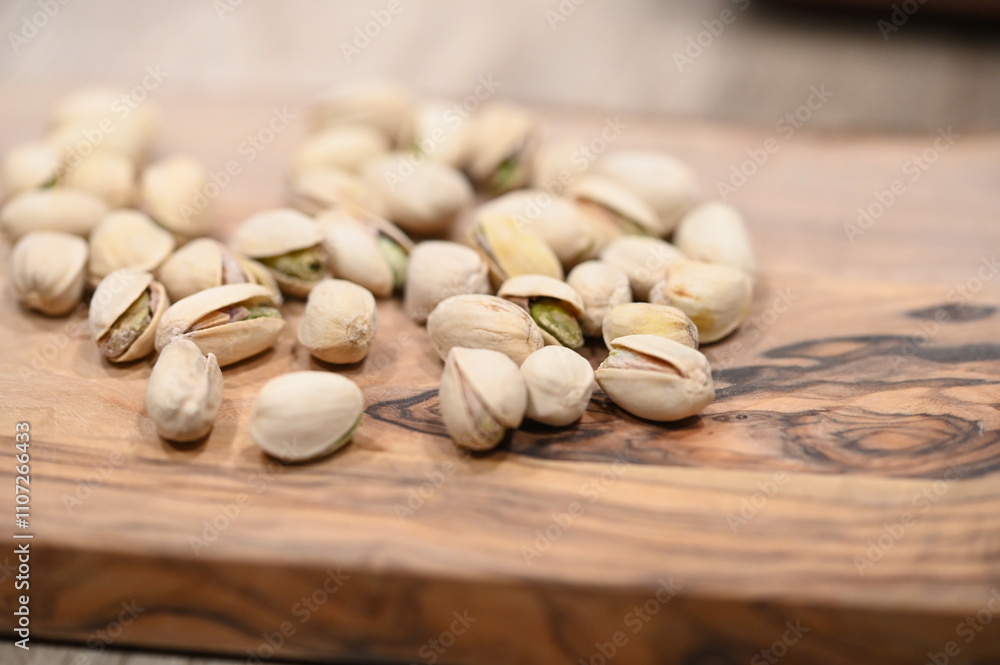 close up of a bunch of pistachios close up of a bunch of pistachios