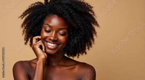 Black Woman With Curly Hair Radiates Joy and Serenity in Soft Light