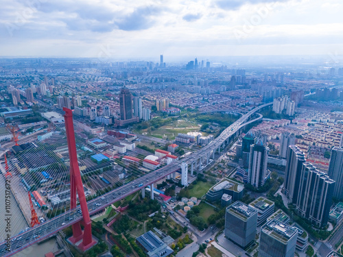 The drone aerial view of YangPu bridge and HuangPu river in Shanghai, China. photo