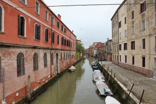 Cloudy day. Away from the tourist crowds in Venice, there are many beautiful neighborhoods to explore with much less boat traffic photo