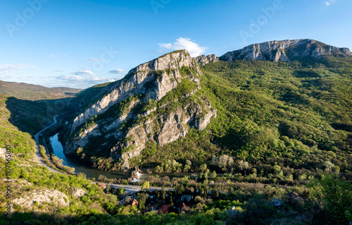 Sicevo Gorge (Sicevacka klisura) in Serbia. Mountains and river on early spring sunny day. The gorge in the middle of mountains. photo